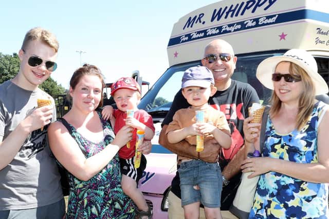 Pictured Left to right  Leo Miller, Emily miller, jacob steadman, Parker Steadman, Martin Oates and Christine Oates enjoying an ice cream. Picture: Royal Navy