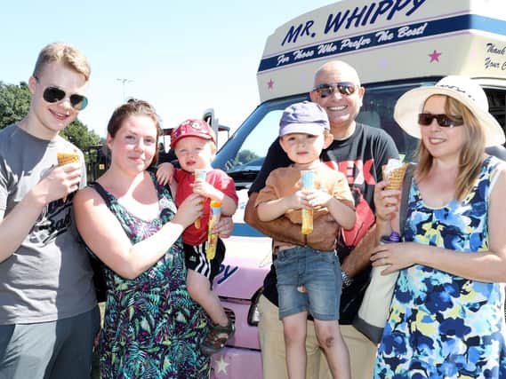 Pictured Left to right  Leo Miller, Emily miller, jacob steadman, Parker Steadman, Martin Oates and Christine Oates enjoying an ice cream. Picture: Royal Navy
