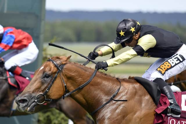 Silvestre de Sousa heads for victory on Tommy G / Picture by Malcolm Wells