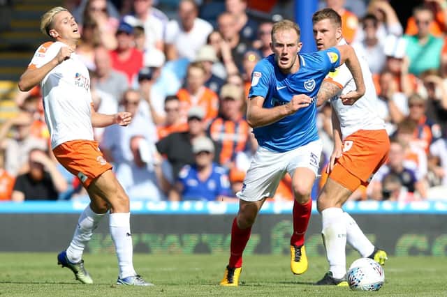 Pompey defender Matt Clarke brings the ball out of defence Picture: Andrew Fosker