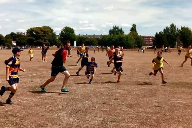 Players in the touch rugby game for the Rugby Against Cancer event in Southsea. Picture: David George