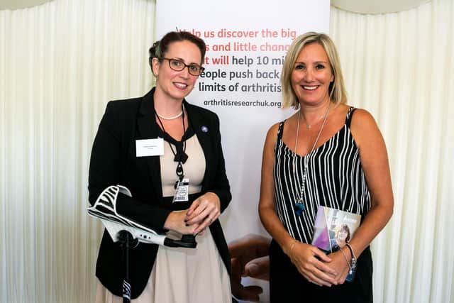 Caroline Dinenage, right, at an Arthritis Research UK event in parliament. Picture: Pete Jones