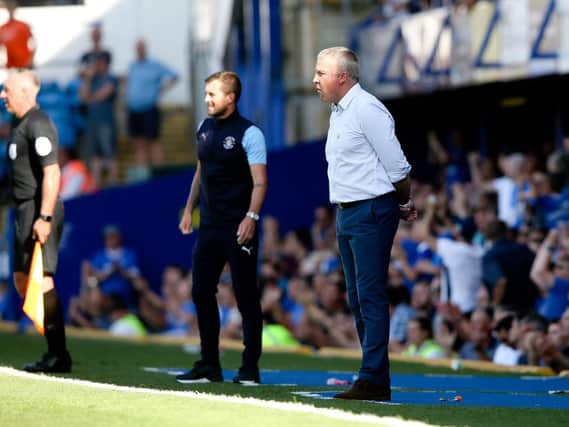 Luton boss Nathan Jones and Pompey manager Kenny Jackett. Picture: Andew Fosker