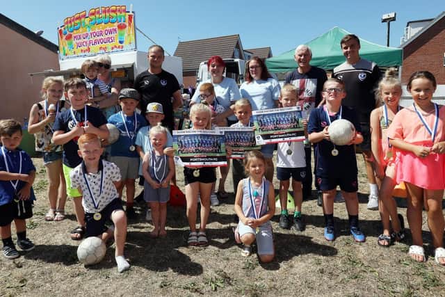 Children with organisers and helpers including staff from Pompey in the Community. Family Fun Day at Stamshaw and Tipner Community Centre, Portsmouth, in support of children with special needs. Picture: Chris Moorhouse