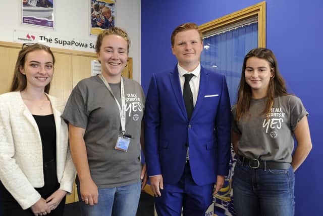 Left to right, Meg Higgs (16), staff member Chelsea Evans, Adam Sawyer (16), and volunteer Sophie Raymond