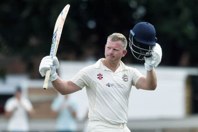 Eastbournes James Hockley celebrates his century on his way to a remarkable 240 from 172 balls against Brighton at the Saffrons last Saturday