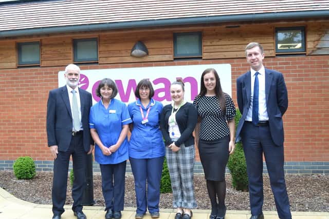 Churchers Solicitors with volunteers after a visit to Rowans Hospice, L-R: Managing partner, Ian Robinson, Rowans Hospice team members, trainee solicitor Georgia Chandler, and trainee solicitor Daniel Norris