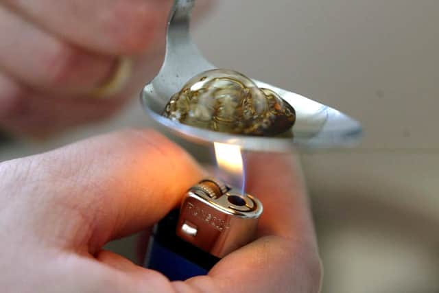 Drugs and drug-taking equipment. Picture: PA/Paul Faith