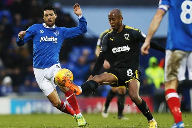 Danny Rose in action for Pompey against AFC Wimbledon last season. Picture: Joe Pepler