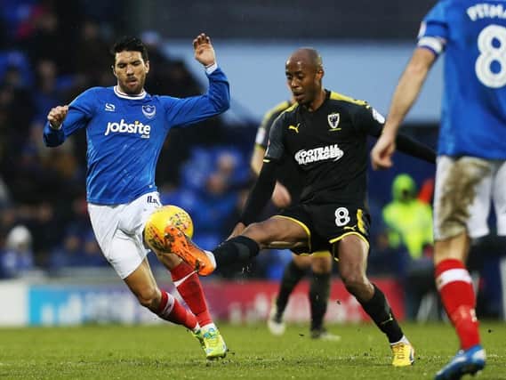 Danny Rose in action for Pompey against AFC Wimbledon last season. Picture: Joe Pepler
