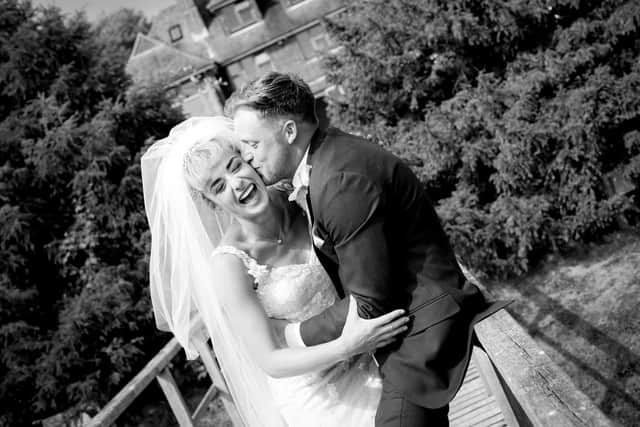Sam and Alice Coulton on their wedding day at All Saints Church, Cuckfield.
