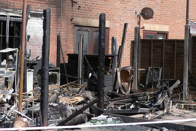 One property was completely damaged by the fire, another two partly. Picture: Habibur Rahman