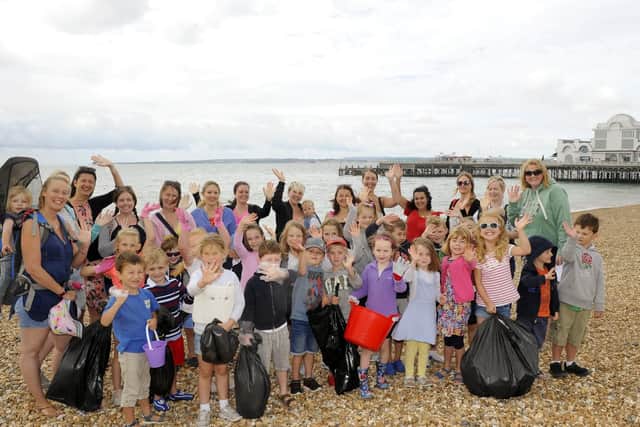 Five-year-old Ava Williams organised a beach clean on the foreshore at Southsea Picture: Malcolm Wells (180808-9395)