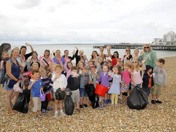 Five-year-old Ava Williams organised a beach clean on the foreshore at Southsea Picture: Malcolm Wells (180808-9395)