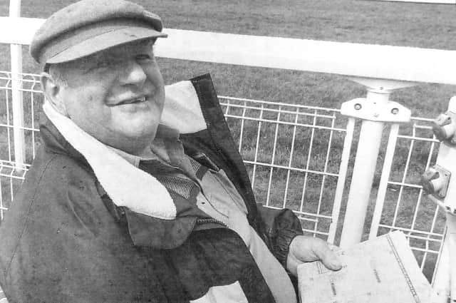 Richard Cramb takes his seat by the furlong marker at Goodwood.