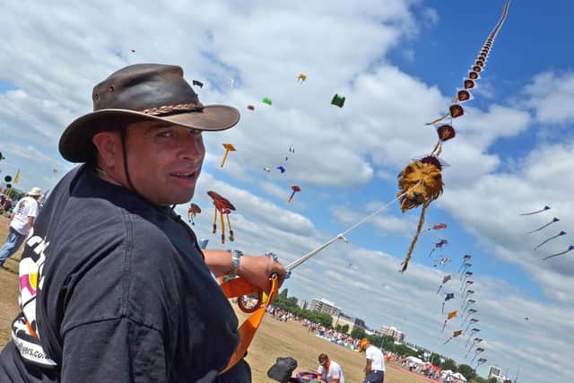 The Brighton Kite Flyers fly a string of 60 kites. Picture: Mick Young