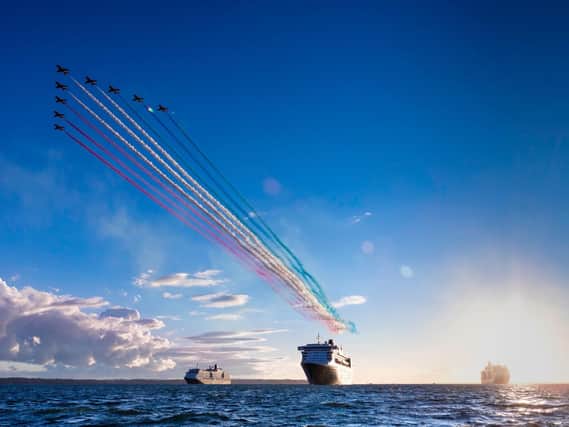 The RAF Red Arrows display team fly over Cunard's three Queens, (from left to right) Queen Victoria, Queen Mary 2 and Queen Elizabeth as the world famous ships depart Southampton. Picture: Chris Ison/ Cunard
