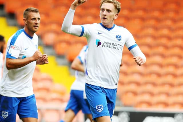 Ronan Curtis celebrates scoring twice for Pompey against Blackpool yesterday