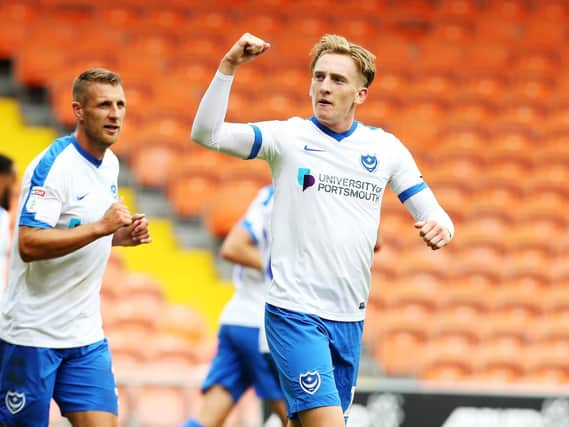 Ronan Curtis celebrates scoring twice for Pompey against Blackpool yesterday