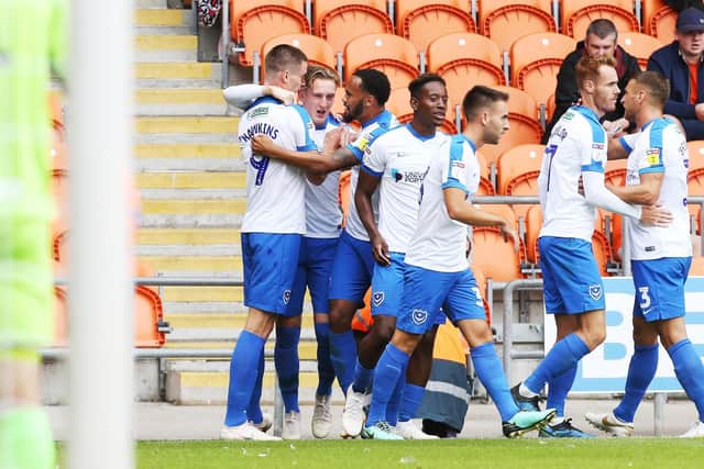 Pompey celebrate Ronan Curtis' opener against Blackpool. Picture: Joe Pepler