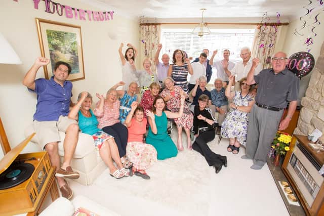 Emma celebrating her 100th birthday with her family and friends at her home in Southsea.