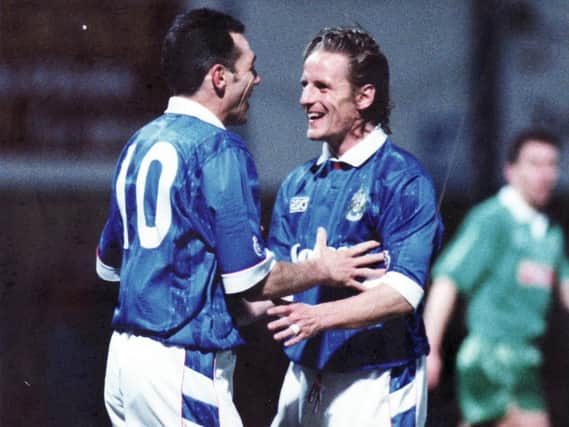 Paul Walsh, right, scored twice in Pompey's 2-2 quarter-final draw against Manchester United at Old Trafford in the 1993-94 season