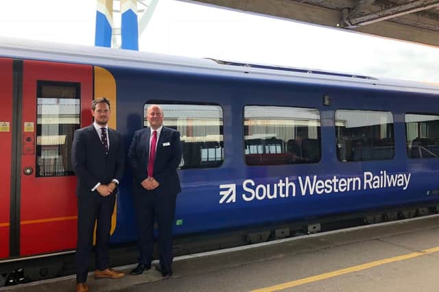 Stephen Morgan, Portsmouth South MP, with Andy Mellors, managing director of South Western Railways at Portsmouth Harbour Station