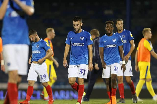 Pompey dejected defeat to AFC Wimbledon. Picture: Joe Pepler