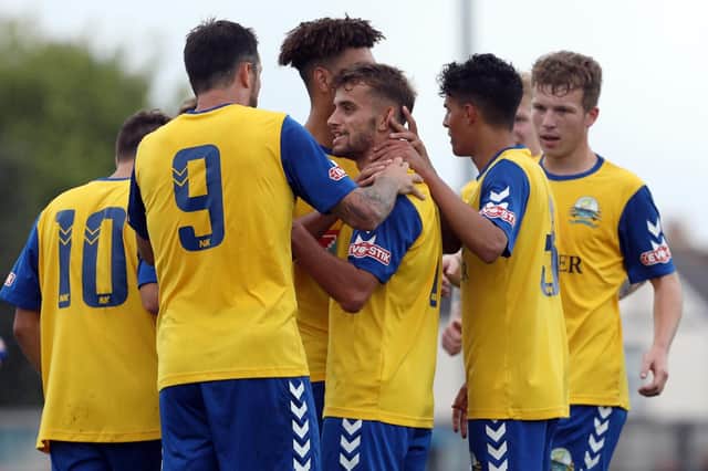 Patrick Suraci is congratulated after netting for Gosport Borough against Kings Langley. Picture: Chris Moorhouse