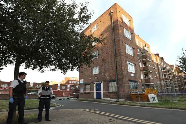 Police outside Landor House. Picture: Jonathan Brady/PA Wire