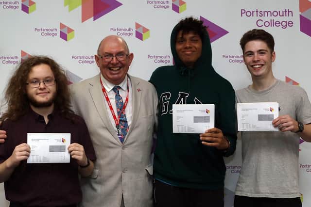 Principal Steve Frampton with students, from left, Adam Lowe, Michael Hirst and Nathan Clark. Picture: Chris Moorhouse