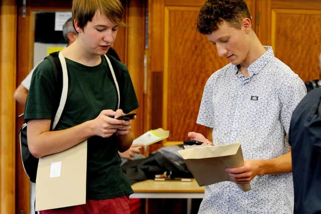 Students from Bay House School in Gosport, picked up their A-level results. Picture: Sarah Standing