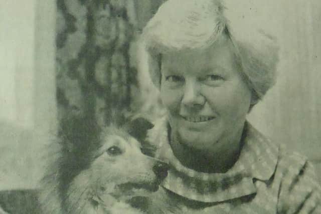 Chris Haggar with her Shetland sheepdog Fancy, who was kept in quarantine for 12 months.