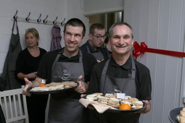 Ralph Morgan and Richard Dore serving up some food. Picture: Habibur Rahman