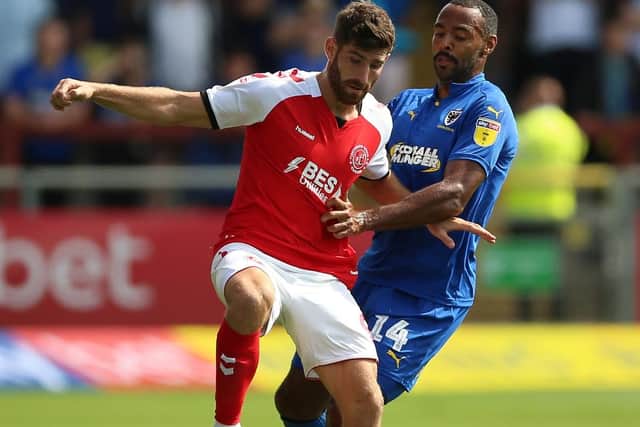 Ched Evans, left, scored for Fleetwood. Picture: PA