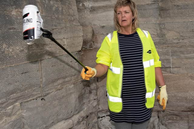 Marie Hargreaves from Southsea found a ripped can with sharp edges in the walls  Picture: Vernon Nash (180419-003)