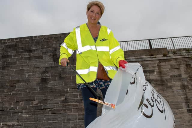 Lizzie Christie from Cosham helped clean the beach.  Picture: Vernon Nash (180419-005)