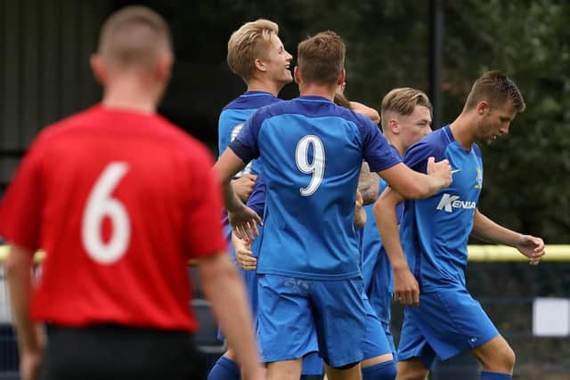 Baffins Milton Rovers celebrate Tommy Leigh's goal against Cowes Sports. Picture: Chris Moorhouse
