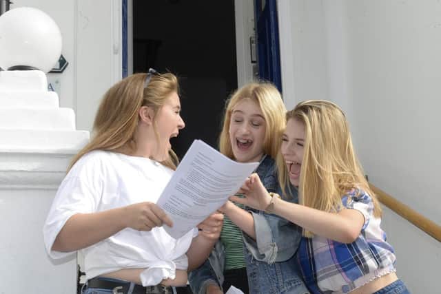 Students celebrate GCSE results last year
