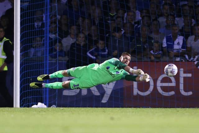 Keeper Craig MacGillivray helped Pompey continue their fine run of form. Picture: Joe Pepler