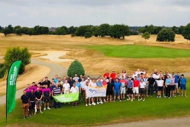 The teams at the charity golf day.
