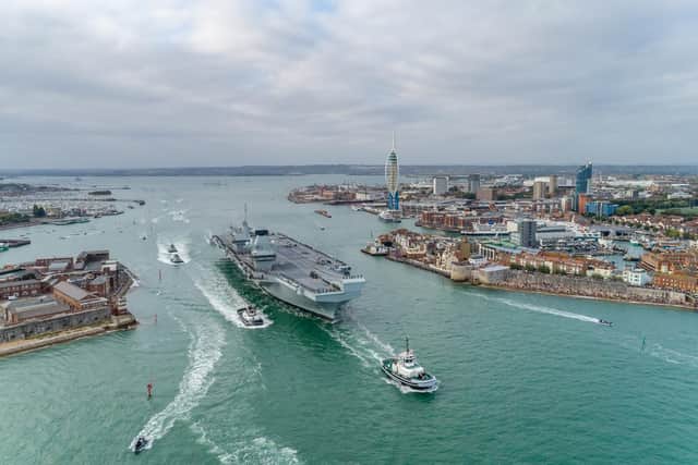 HMS Queen Elizabeth leaving Portsmouth last Saturday. Picture: Shaun Roster Photography