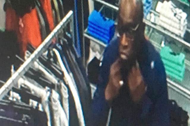 CTV stills of Desmond Clarke stealing a 205 Gant cardigan from Escape Menswear in Portsmouth