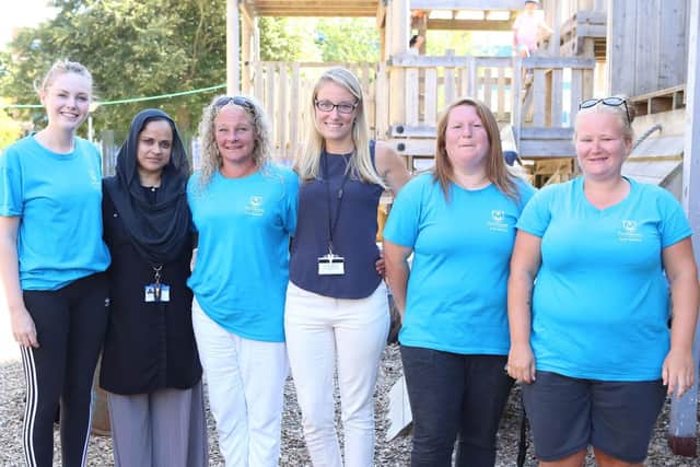 Health Development Officers Marshada Chowdhury (second left) and Holly Eastlick (third from right) alongside staff of Somers Town Adventure Playground