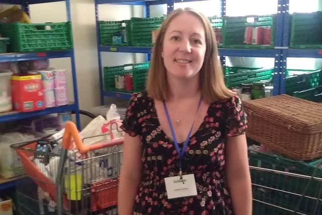 Carly Butler from Portsmouth Food Bank in the food store room in Southsea