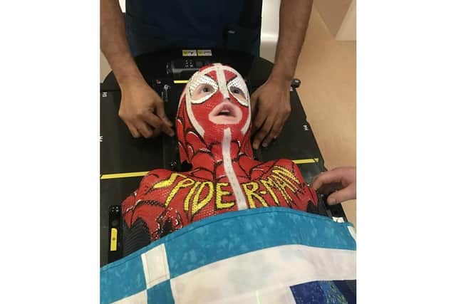 Harry in his Spiderman mask