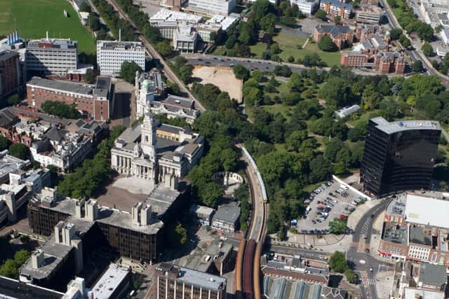 Now - a view of the Guildhall and square today.