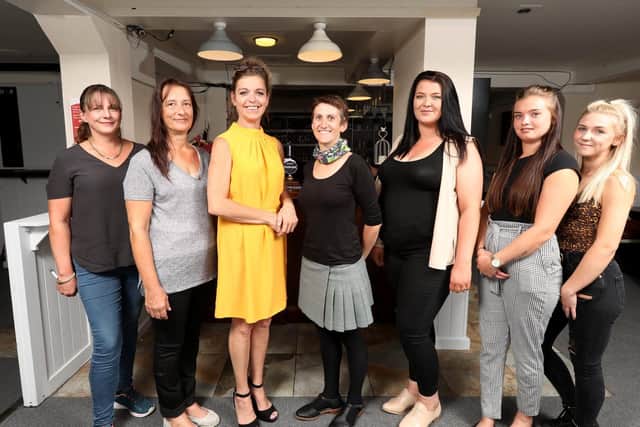 From left, Andrea Cheason, Louise Frampton, Lorraine Witheyman, Ce Thomas, Aimee Marlow, Brittanie Lundbech and Hannah Adams. Landlady Lorraine Witheyman has reopened The Good Intent pub, Trinity Street, Fareham