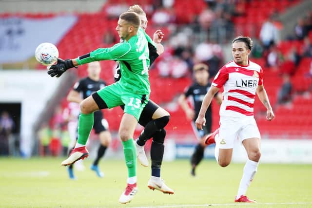 Doncaster's keeper Marko Marosi was sent off. Picture: Joe Pepler