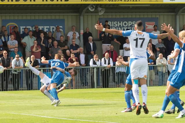 Hawks and Salford players react as Ryan Woodford is brought down in the box. Picture: Keith Woodland